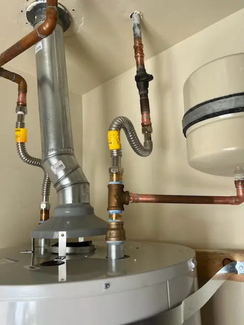 Water heater installation and plumbing repair in The Greater Corona Village